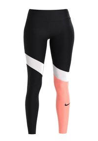 Leggings de sport noirs avec un design en color-block, présentant un panneau diagonal blanc et un accent de jambe pêche. Comprend un petit logo noir.