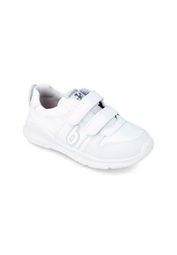 Zapatilla deportiva blanca con parte superior de tela, dos correas de Velcro, suela de goma y un logo sutil en el lateral. Textura suave, diseño minimalista.