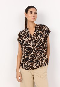 Kurzarmhemd mit einem schwarzen, braunen und beigen Blattmuster, V-Ausschnitt und Knopfdetails, aus leichtem Stoff gefertigt.
