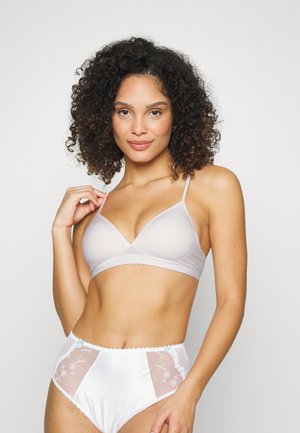 Light gray wireless bra with a triangular shape, smooth material, thin straps; paired with high-waisted white panties featuring mesh panels and floral embroidery.