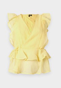 Top amarillo cruzado con mangas cortas con volantes y dobladillo peplum. Fabricado con tejido ligero de acabado texturizado. Presenta un detalle de cintura con lazo.