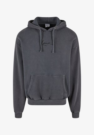 Hallide hall wear, mille tasku, nööriga kapuuts, venitatud mansetid ja ääred. Rinnas on tikitud logo. Puuvillasegune kangas.