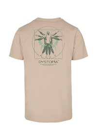 Beige cotton T-shirt featuring a graphic print of a figure with wings, surrounded by geometric lines, and the word "DYSTOPIA" below.