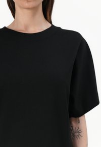 DRYKORN MENJA - Haljina od žerseja - black