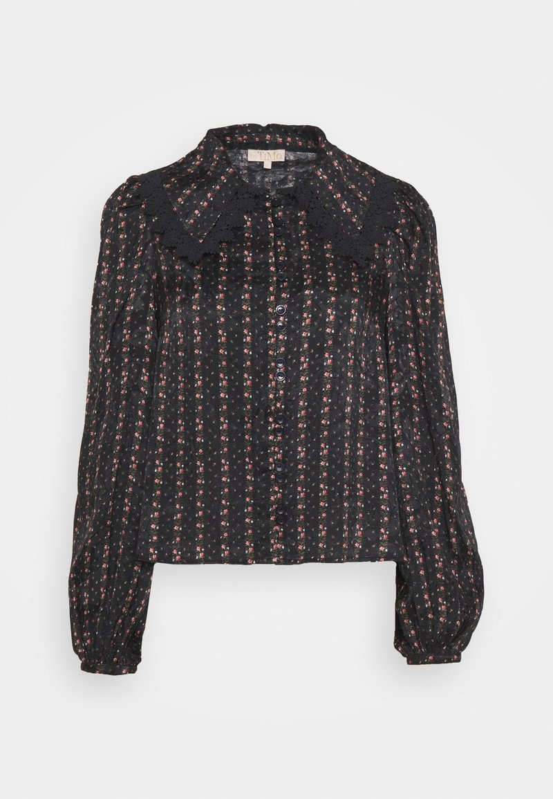 Blusa nera a maniche lunghe con colletto in pizzo, caratterizzata da un motivo floreale e da strisce verticali. Chiusura frontale con bottoni e maniche a sbuffo.