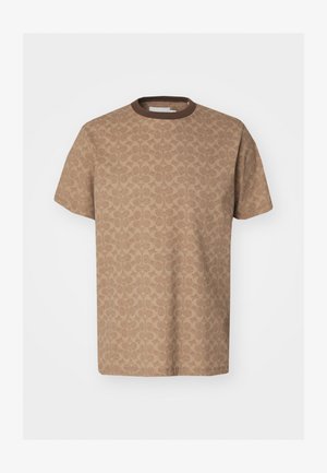 Brown short-sleeve T-shirt featuring an all-over subtle circular pattern, round neckline, and soft texture. Designed for casual wear.
