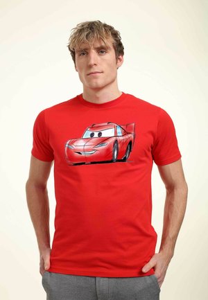 Red cotton t-shirt featuring a cartoon car graphic on the front, short sleeves, fitted design, and a smooth texture.