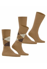 Quattro paia di calze a compressione marroni, due semplici e due con motivi argyle beige, marrone scuro e bianco sulla gamba.