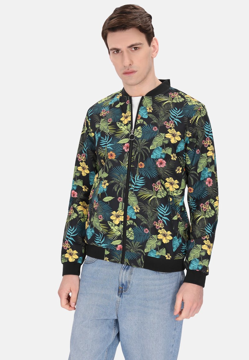 Jachetă bomber neagră cu un model floral vibrant în galben, roz și albastru, cu manșete și margine ribbate și închidere prin fermoar în față.