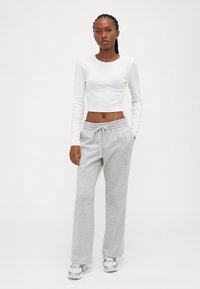 GAP Petite HERITAGE - Treniņtērpa apakšdaļas - light heather grey
