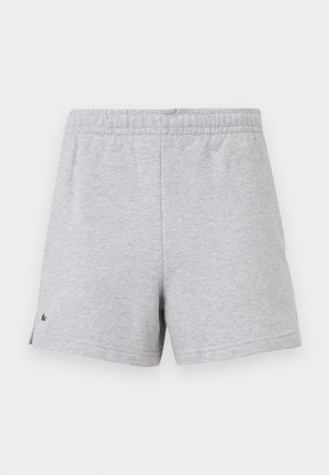 Light gray cotton shorts with elastic waistband and small green logo on left hem against white background.