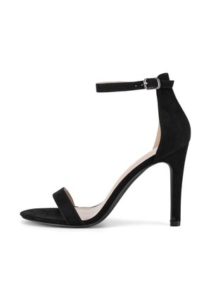 Sandal alto in suede nero con cinturino sottile alla caviglia, punta aperta e soletta sagomata. Il tacco è snello ed elevato.