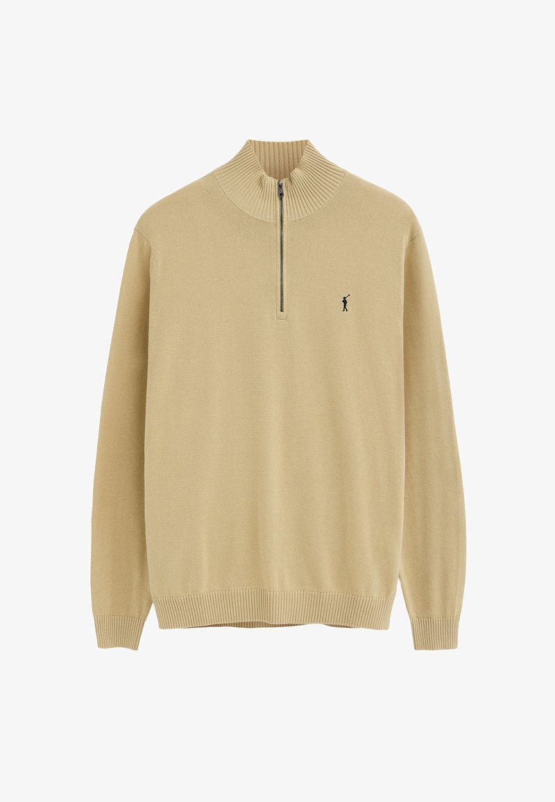 Pull beige à fermeture éclair quart, avec col, poignets et ourlet côtelés, arborant un petit logo brodé de golfeur noir sur la poitrine gauche.