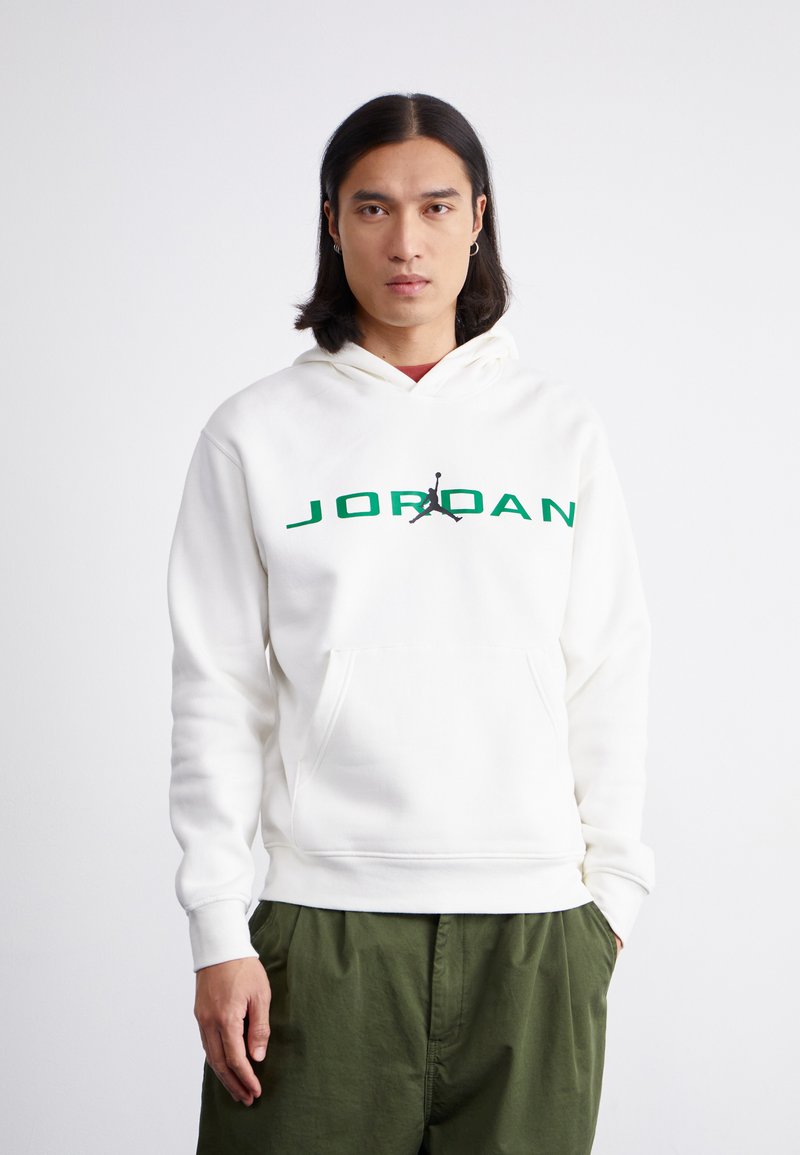 Fehér kapucnis pulóver zöld "JORDAN" felirattal és fekete Jumpman logóval. Kenguruzseb; bordás mandzsetta és szegély; puha tapintás.