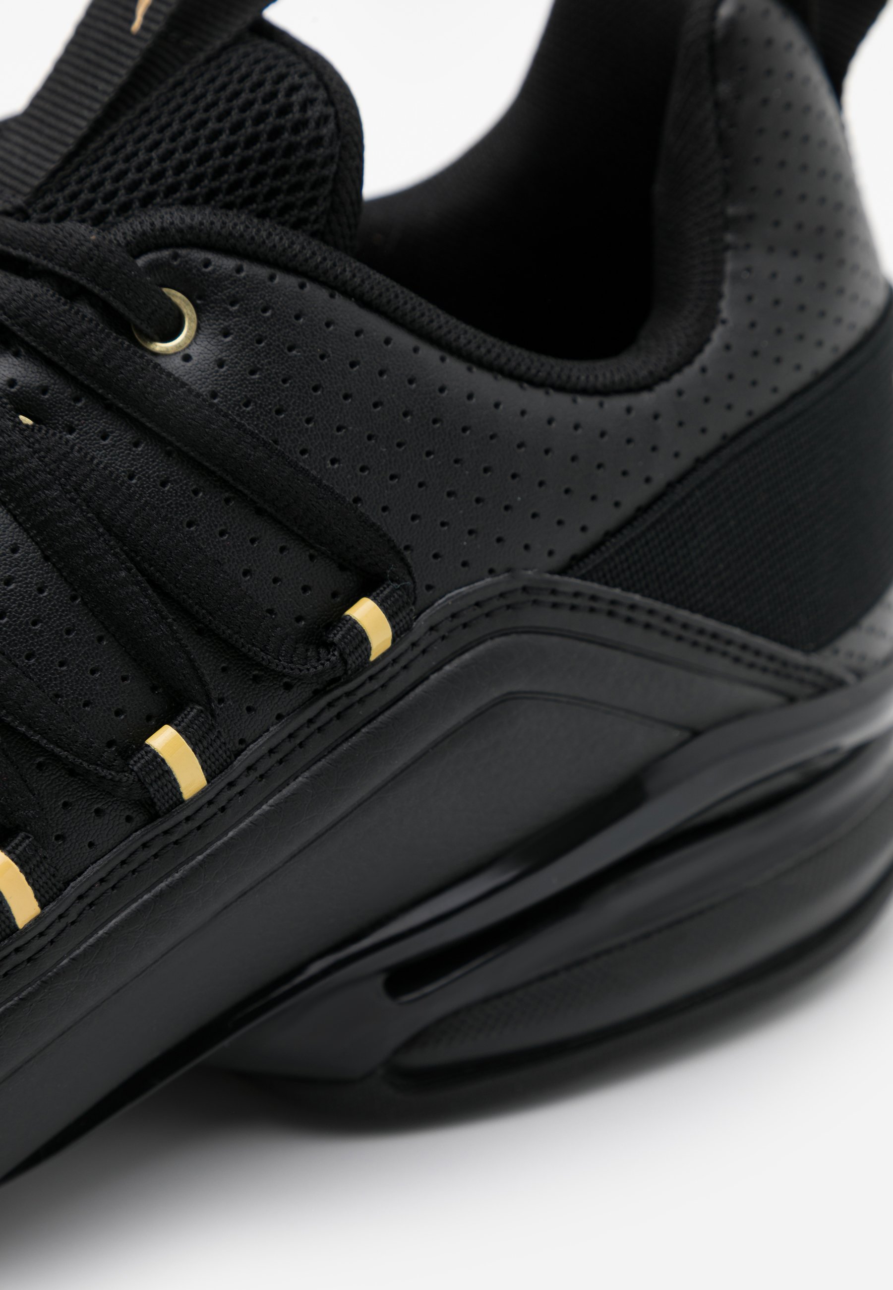 puma axelion black gold