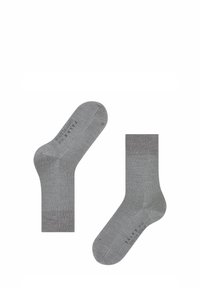 Calzini di cotone grigi con una texture liscia, dotati di talloni e punte rinforzati. Il design include segnature per il piede sinistro e destro.