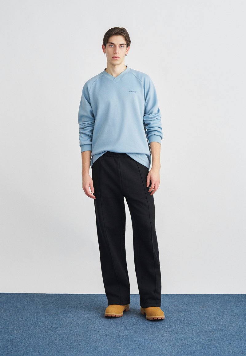 Carhartt WIP POND CORPS PANT - Teplákové kalhoty - black