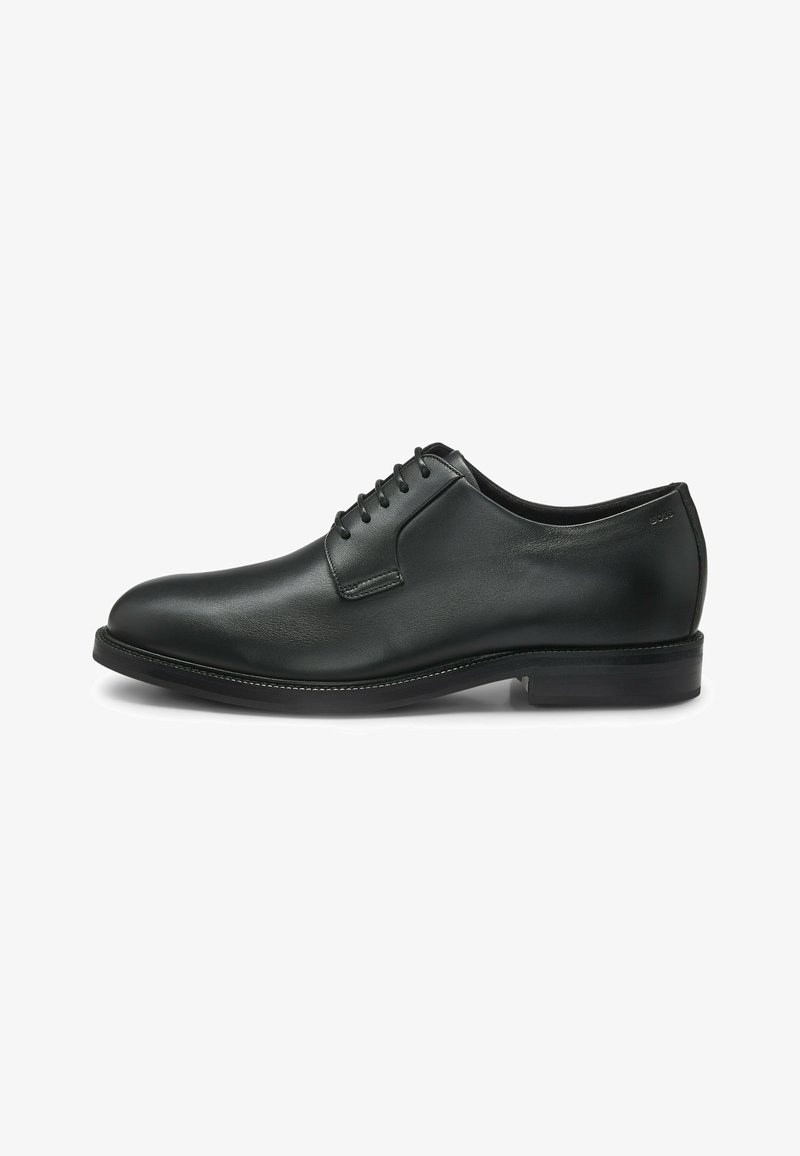 Black leather dress shoe with a rounded toe, smooth texture, low-profile sole, six eyelet lace-up design, and minimal stitching details.