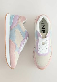 Suede sneakers featuring pastel pink, blue, and beige panels. White laces and sole, textured accents. Light brown rubber outsole.
