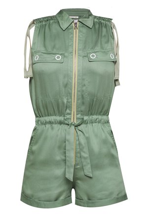 Green satin romper with a collar, front zipper, and two chest pockets. Features drawstring waist and open shoulder design details.