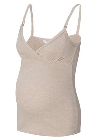 Beige graviditetstop med justerbare spaghetti-stropper, ribbet tekstur, crossover-design og samlet detalj på siden.