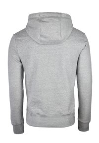 Sudadera gris hecha de un suave tejido texturizado. Cuenta con capucha con cordón, mangas largas y puños y dobladillo acanalados. Diseño sencillo.