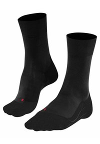 Calzini neri con parte superiore a coste, corpo liscio e punte rinforzate. Presentano un piccolo logo rosso sul lato, progettati per comfort e durata.