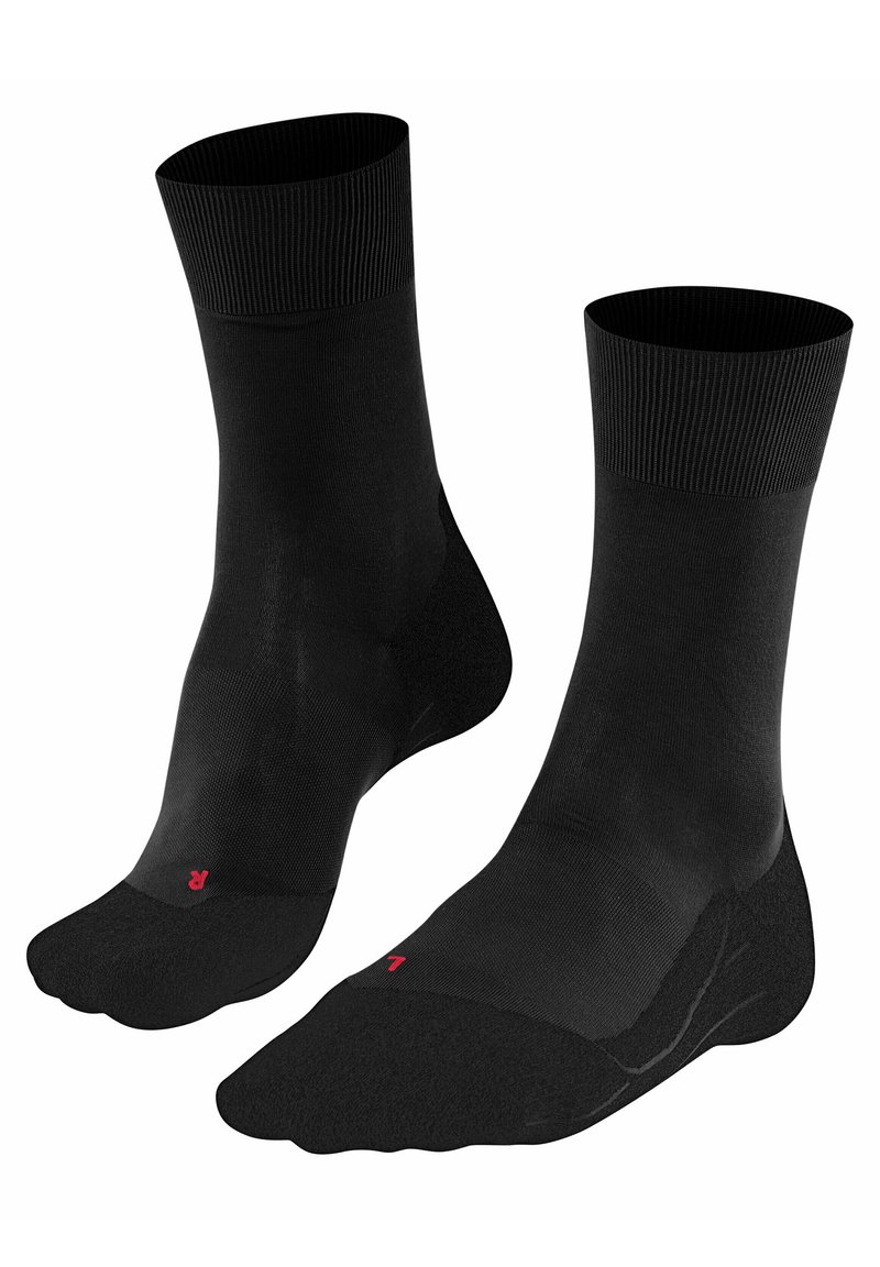 Calzini neri con parte superiore a coste, corpo liscio e punte rinforzate. Presentano un piccolo logo rosso sul lato, progettati per comfort e durata.