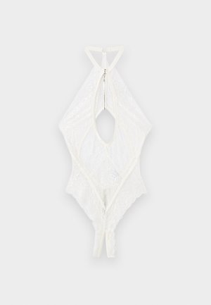 Body blanc en dentelle à col halter avec fermeture éclair dans le dos et découpe en forme de goutte à l'avant, avec bords festonnés.