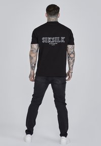 SIKSILK DISTRESSED - Straight leg jeans - washed black