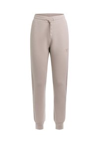 Helle beigefarbene Sweatpants aus weichem Stoff, mit einem Kordelzugbund, schmal zulaufenden Beinen und einem kleinen LOGO-Detail auf der Vorderseite.