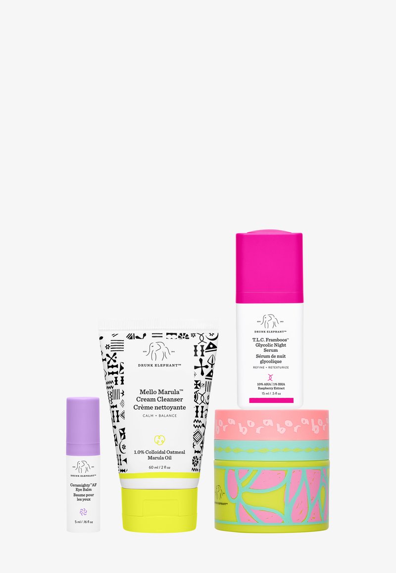 Set of four skincare products featuring colorful packaging: white tube with black patterns, pink bottle, lavender tube, and round container with pastel design.