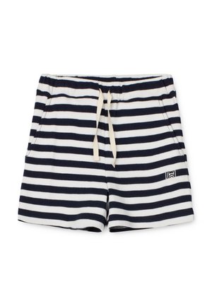Pantaloni corti a righe blu navy e bianche con vita elastica e cordoncino. Tessuto morbido con tasche laterali e un piccolo logo sull'orlo inferiore.