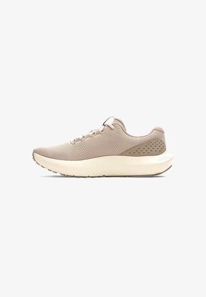 Beige athletic shoe with a textured mesh upper, rounded toe, and a thick, cushioned sole. Features small perforations on the heel.