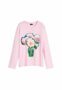 Hele-roosa pikkade varrukatega T-särk, millel on pojengide lillemuster rohelises vaasis, lõdva lõikega ja pehme puuvillase tekstuuriga.