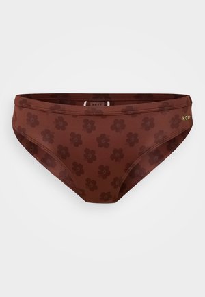 Brune bikini-bukser med et blomsterdesign, lavet af strækbart materiale. Har en glat tekstur og Roxy-mærkning i gult.