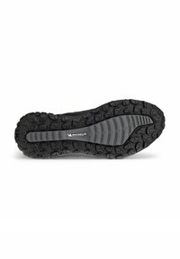 Soletta di scarpa in gomma nera con un motivo testurizzato, caratterizzata da scanalature profonde e una zona centrale liscia. Logo "MICHELIN" visibile.