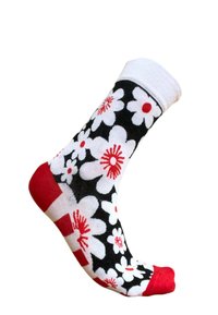 Calcetín negro con flores blancas y detalles en rojo. La punta y el talón son rojos, con un puño blanco. Material de algodón, diseño ajustado.