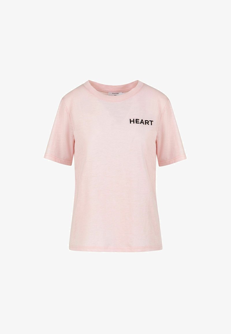 T-shirt en coton rose pâle à manches courtes avec col rond et texte noir "HEART" sur le haut de la poitrine à gauche.