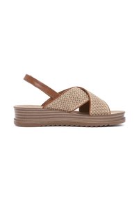 Brown leather and woven texture sandal with a wedge sole, cross-strap design, and a functional ankle strap for secure fit.