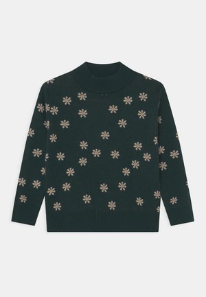 Pull en tricot vert avec un col montant, des manches longues et un motif floral en crème et jaune sur tout le tissu.