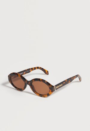 Lunettes de soleil ovales en écaille de tortue avec verres marron et lettrage doré « Palm Angels » sur la branche.