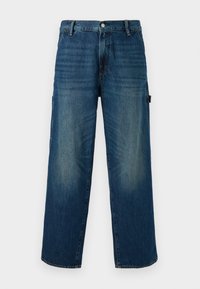 Bredde ben blå denim bukser med falmede aksenter, med en tradisjonell knapp- og glidelås-lukking, og sidelomme på venstre side.