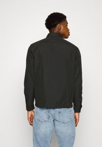 Calvin Klein OVERSHIRT - Suvejakk - black
