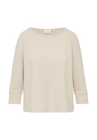 Top in maglina a nido d'ape beige con vestibilità ampia, scollatura rotonda e maniche a tre quarti, caratterizzato da una texture sottile e dettagli cuciti sui polsini.