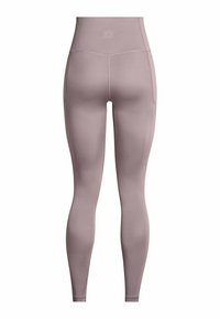 Korkeavyötäröiset, täyspitkät legginsit pehmeässä havunvärisessä sävyssä. Valmistettu sileästä, joustavasta materiaalista, jossa on litteät saumat eikä näkyvää metalliosaa.