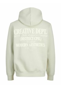 Hellbeige Kapuzenpullover mit weicher Textur, auf der Rückseite mit großer weißer Schrift "CREATIVE DEPT." und "MODERN AESTHETICS.".