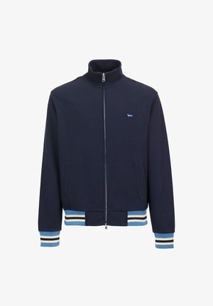 Marineblaue Reißverschlussjacke mit hohem Kragen, mit weißen und blauen Streifenakzenten an den Bündchen und am Saum sowie einem kleinen blauen Logodetail.