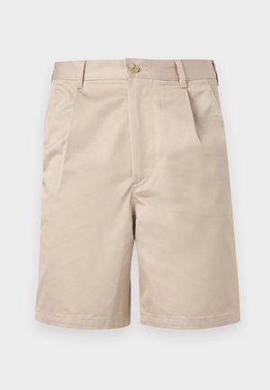 Beżowe szorty do kolan z przednim zapięciem na guzik i zamek, szlufkami na pasek oraz bocznymi kieszeniami.