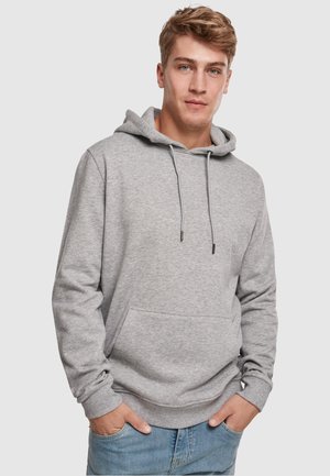 Sudadera gris hecha de una tela suave, con un bolsillo tipo canguro, cordón ajustable y puños acanalados. Diseño casual con un ajuste relajado.